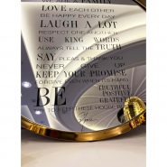 House rules mirror frame gold near